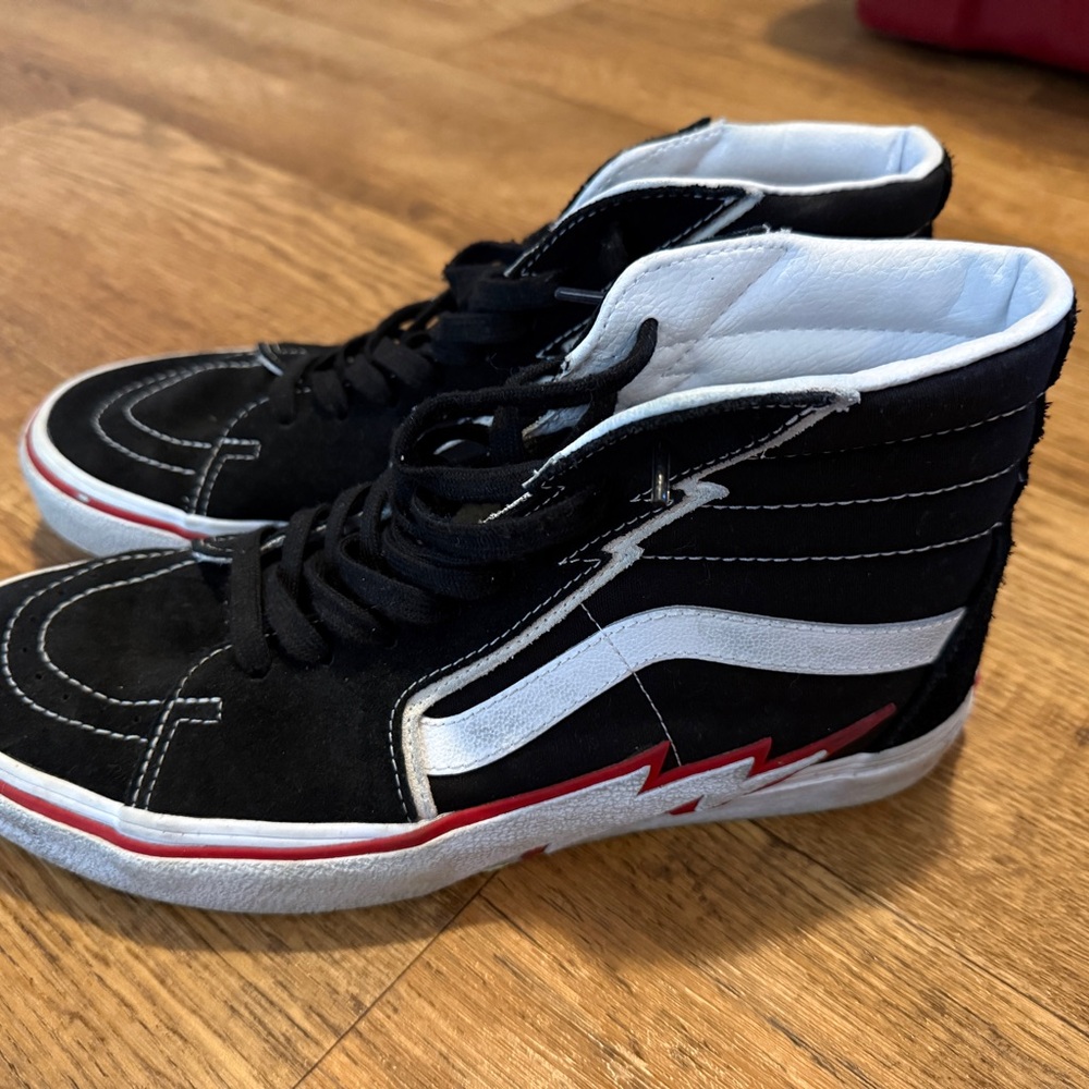 Vans Men’s Black and White High-Tops with Red and white bolt